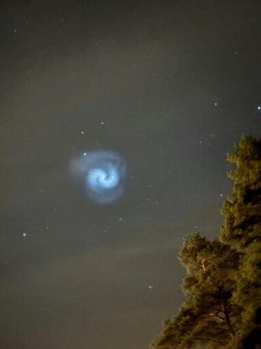 As the rocket's spinning booster fell back to Earth, its fuel froze into crystals to create the spiral