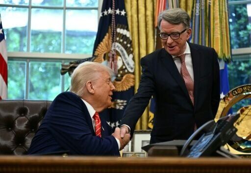 US President Donald Trump shakes hands with British ambassador to the United States Peter Mandelson after making a trade announcement in the Oval Office of the White House in Washington, DC, on May 8, 2025. US President Donald Trump on Thursday announce...