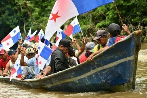 Villagers protest against the planned dam on the Rio Indio