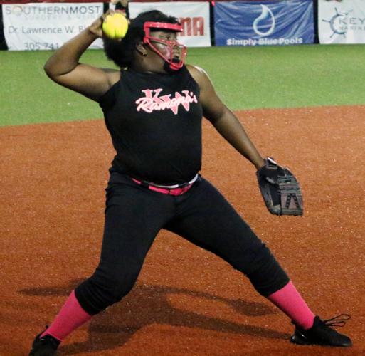 youth softball a division title harlyell throws.jpg