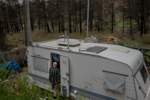 Some residents were left living in caravans after last year's fires destroyed their homes