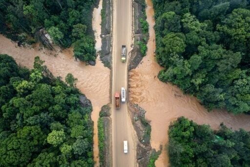 Locals say mud stirred up by mining has stained rivers copper, and the water leaves skin irritated